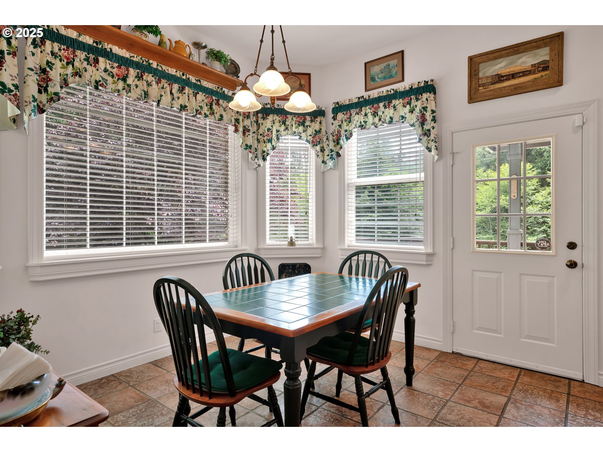 83485 Clear Lake Road Florence, OR 97439 - Photo 20 of 47 a dining room with furniture and window