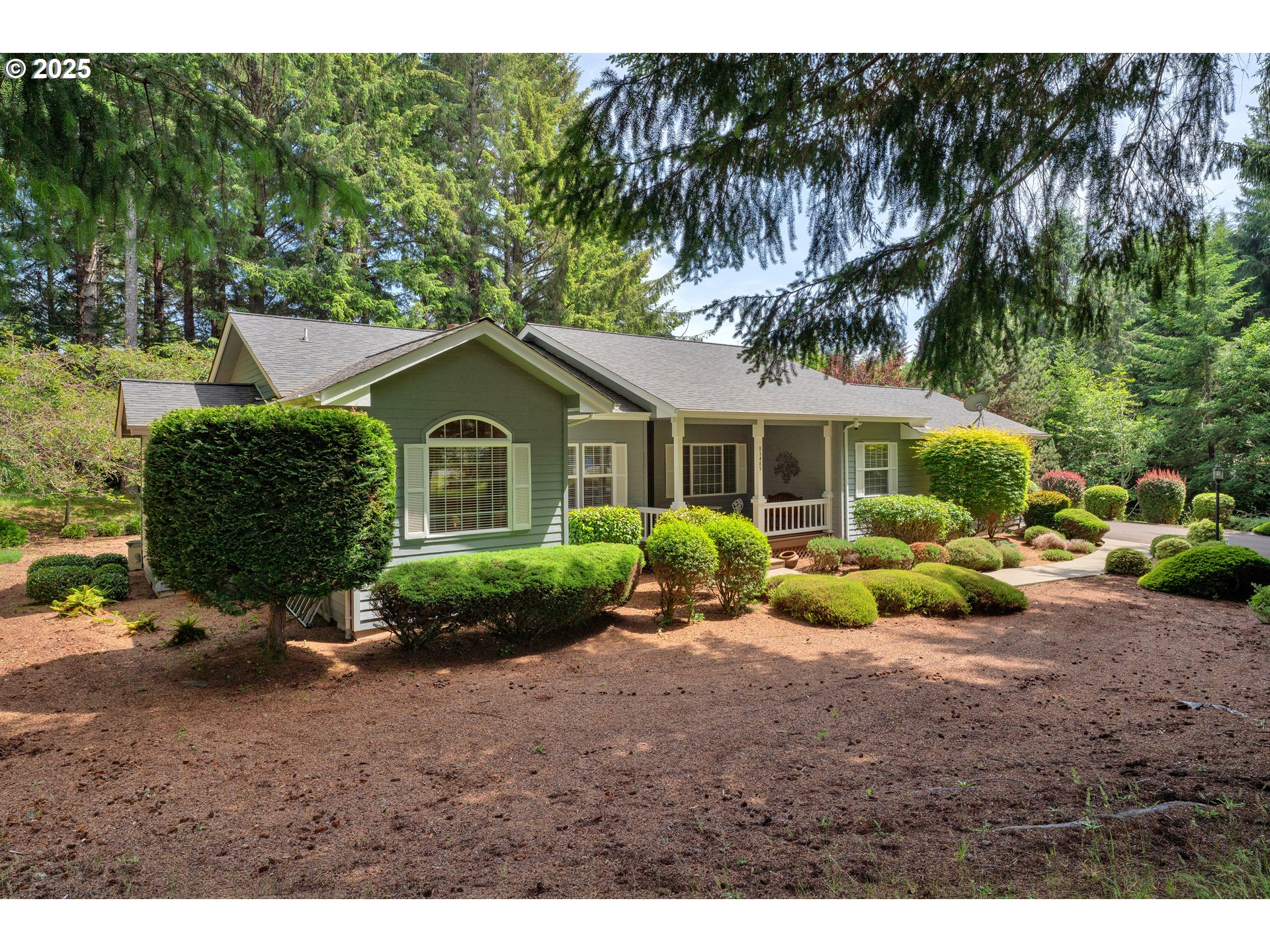83485 Clear Lake Road Florence, OR 97439 - Photo 2 of 47 a view of a house with a yard and potted plants