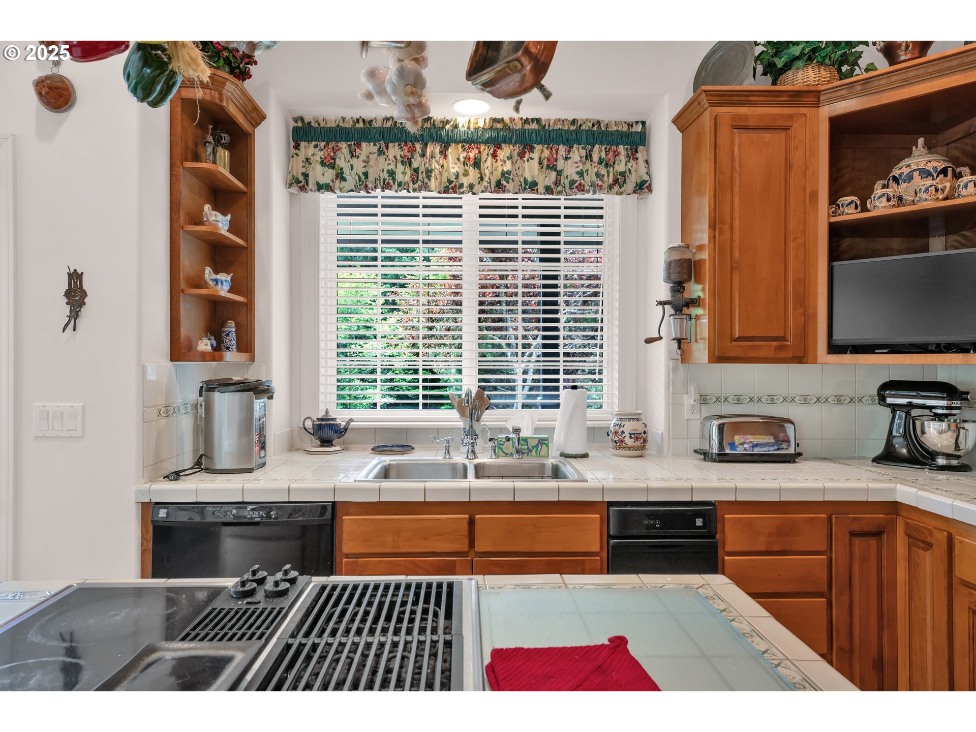 83485 Clear Lake Road Florence, OR 97439 - Photo 21 of 47 a kitchen with granite countertop a sink and a white wooden cabinets