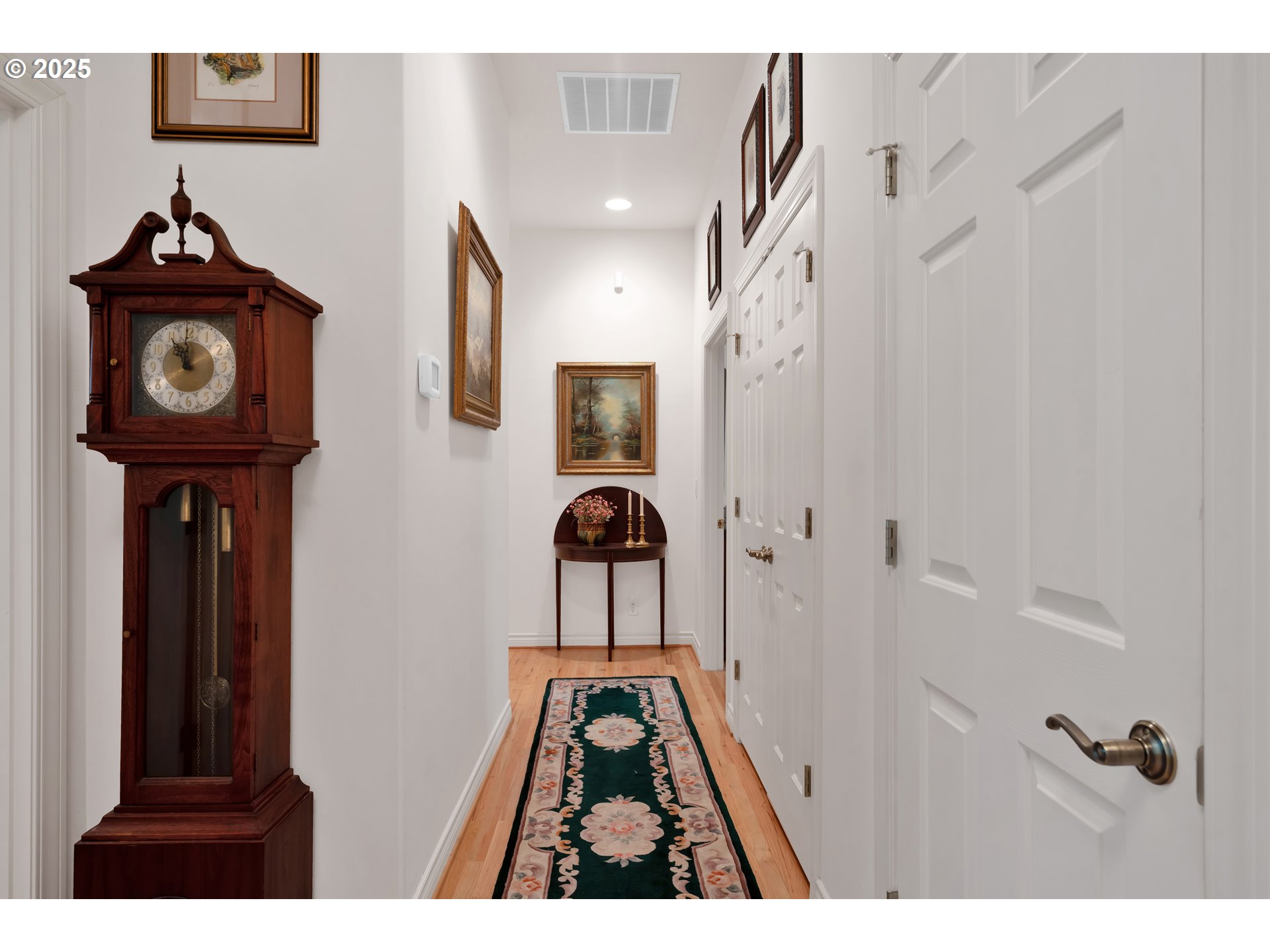 83485 Clear Lake Road Florence, OR 97439 - Photo 24 of 47 a view of a hallway with entryway wooden floor and a front door