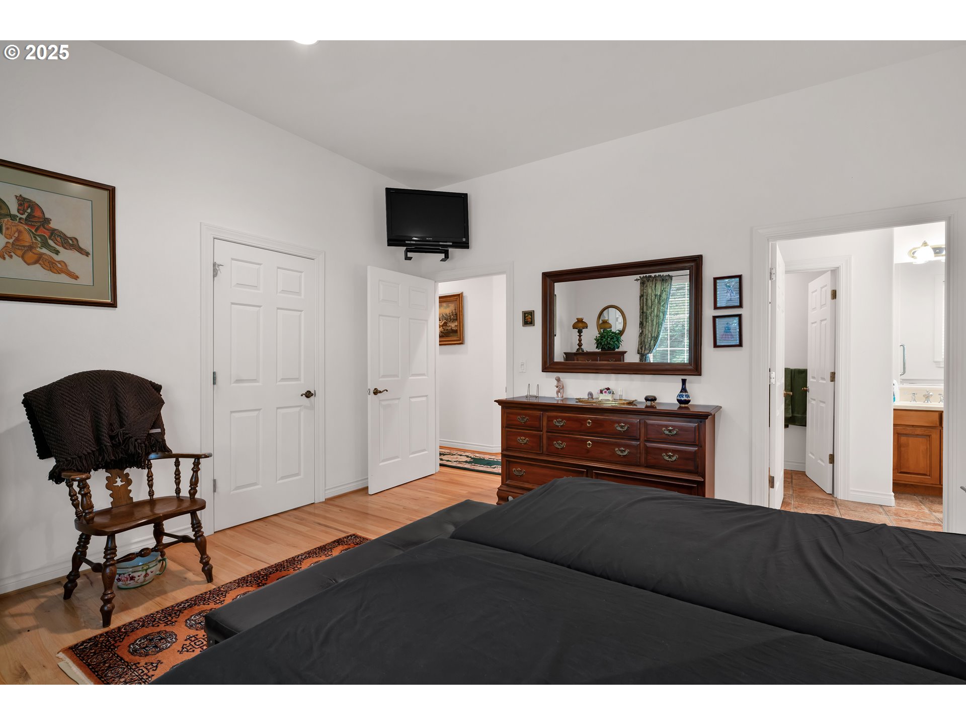 83485 Clear Lake Road Florence, OR 97439 - Photo 26 of 47 a bedroom with a bed and furniture