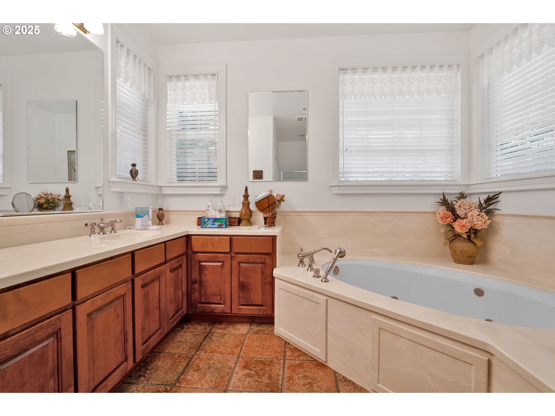 83485 Clear Lake Road Florence, OR 97439 - Photo 28 of 47 a bathroom with a sink double vanity granite tub and a mirror