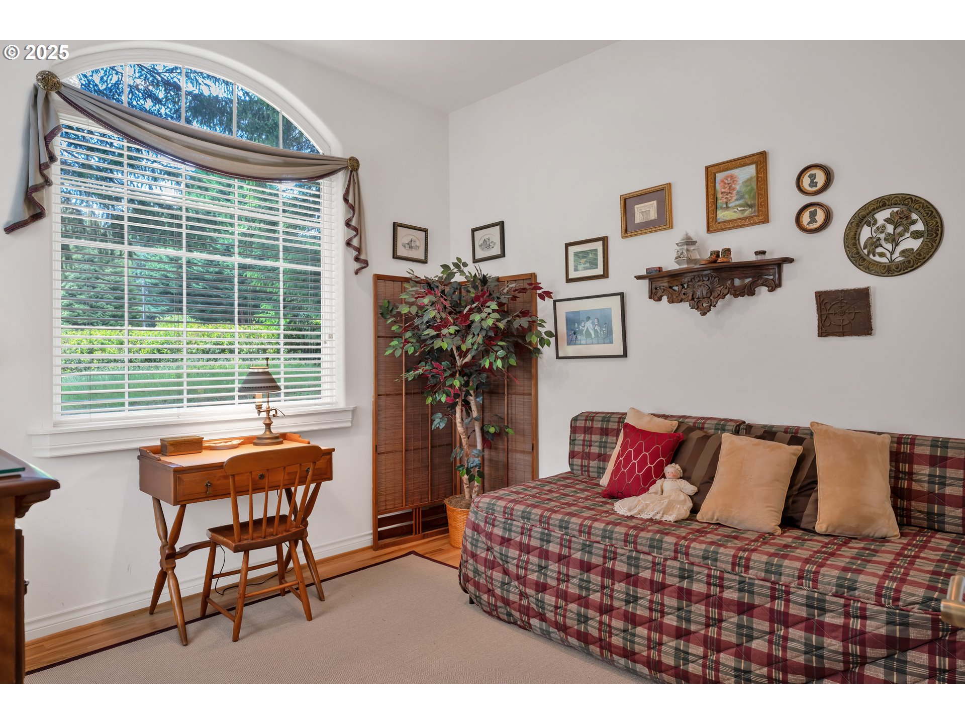 83485 Clear Lake Road Florence, OR 97439 - Photo 32 of 47 a bedroom with a bed and wooden floor