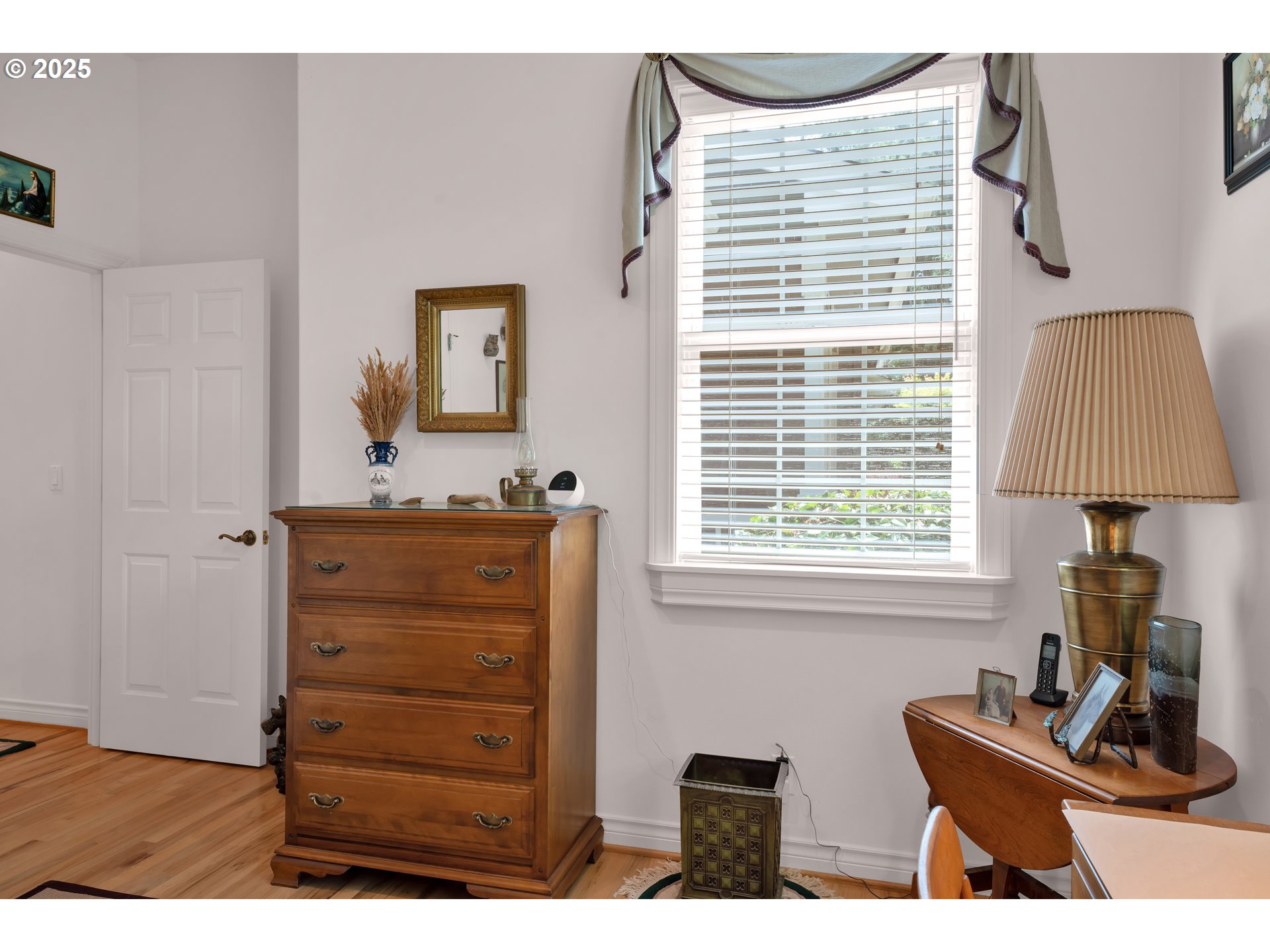 83485 Clear Lake Road Florence, OR 97439 - Photo 34 of 47 a room with a window and a lamp