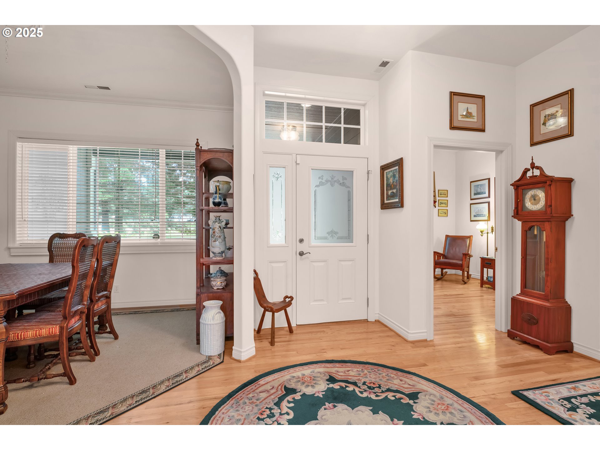 83485 Clear Lake Road Florence, OR 97439 - Photo 8 of 47 a living room with furniture a wooden floor and next to a window