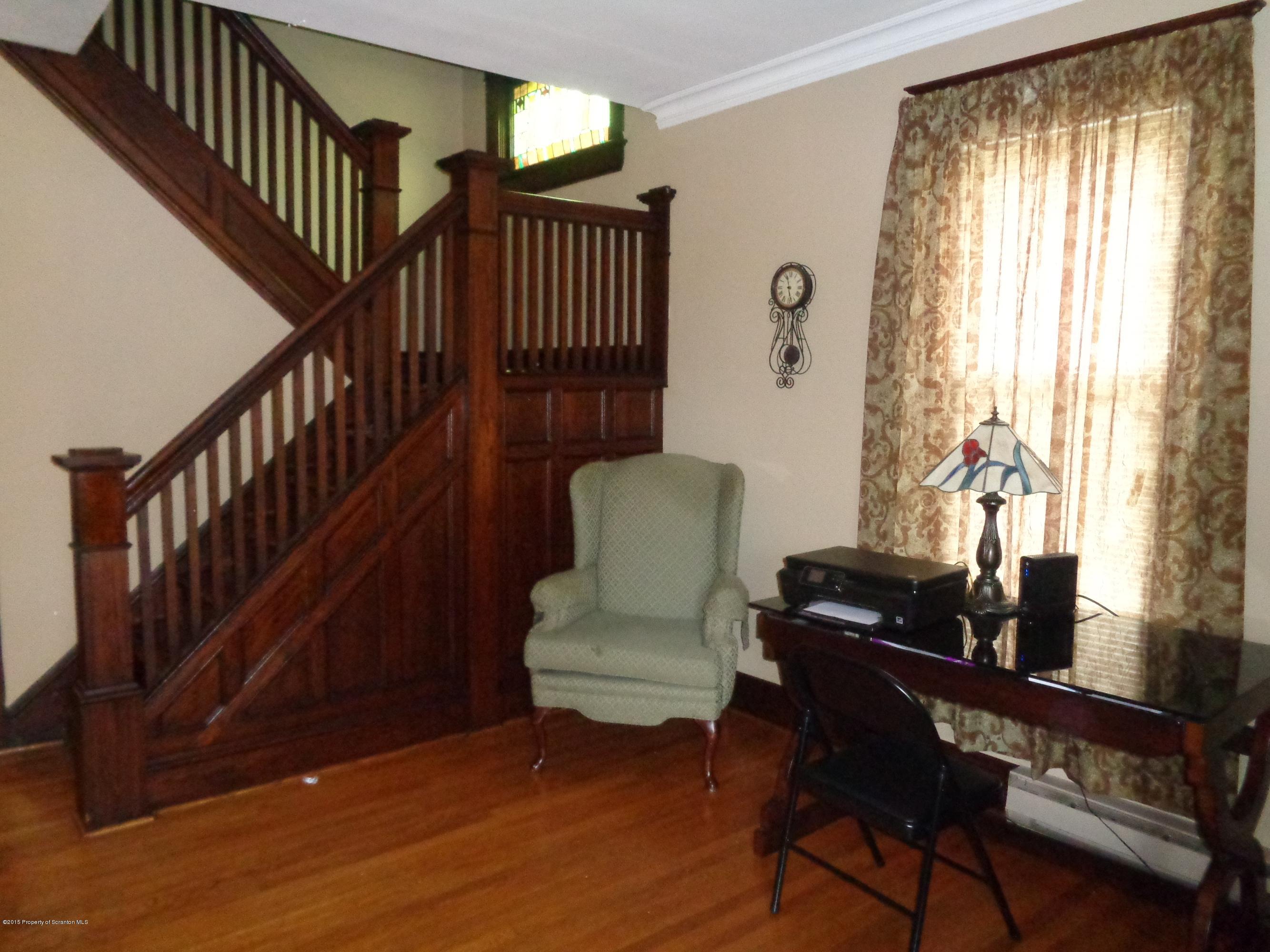 1911 Green Ridge Street Dunmore, PA 18512 - Photo 4 of 16 a living room with furniture and a window