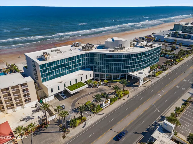 a view of a balcony with chairs