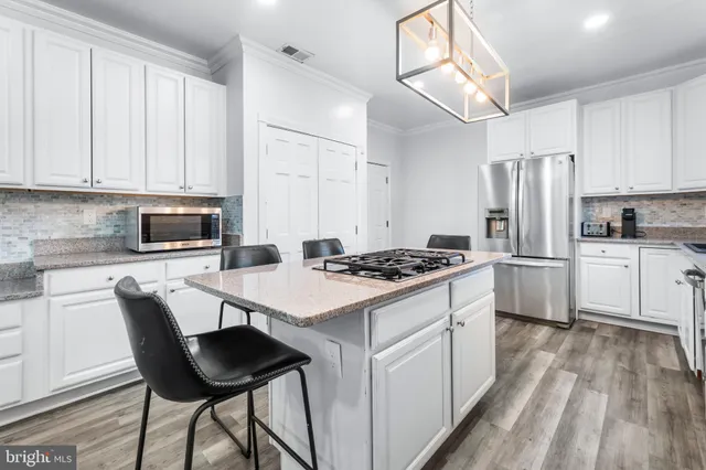 a view of a park with large trees