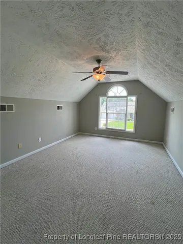 a view of empty room with a window