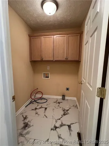 a bathroom with a sink a window and a mirror