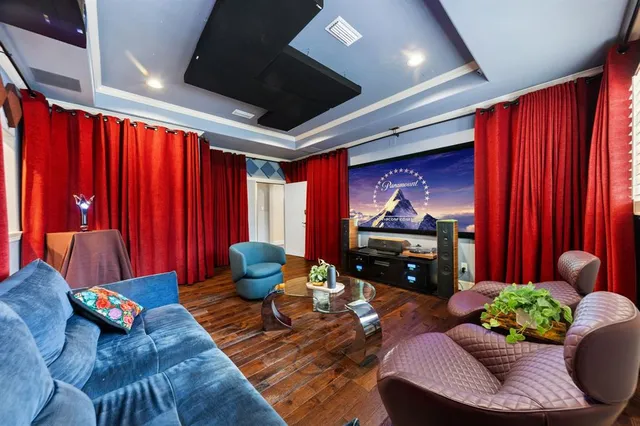 a living room filled with furniture and a fireplace