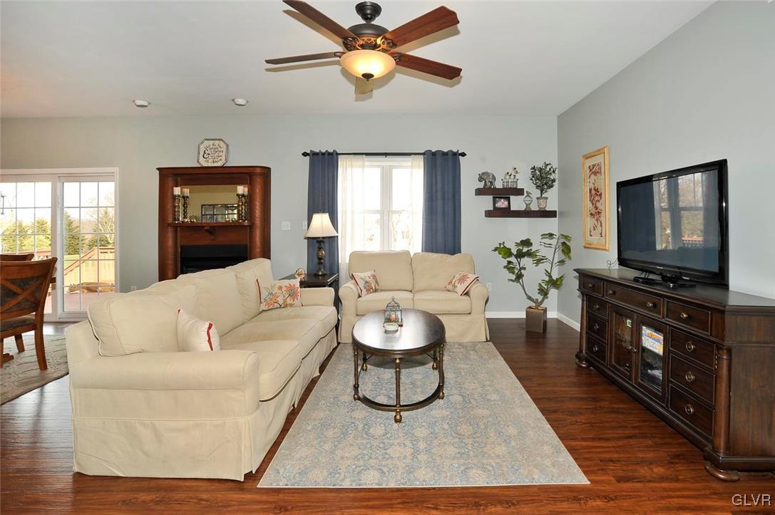 1056 Bushkill Center Road Wind Gap, PA 18091 - Photo 4 of 28 a living room with furniture a window and a flat screen tv