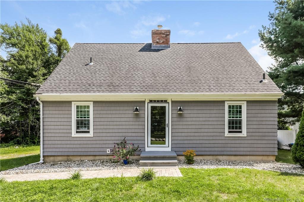 70 Long Hill Road Clinton, CT 06413 - Photo 1 of 1 a view of a house with a yard