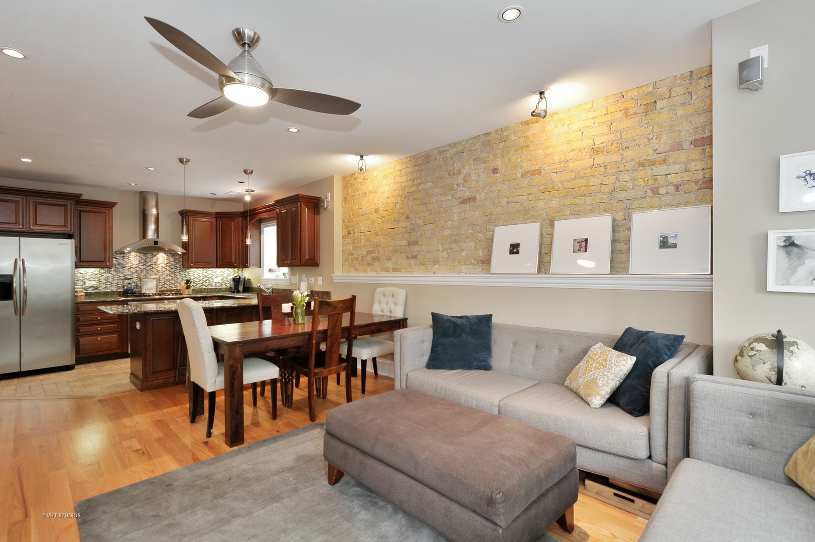 3933 North Marshfield Avenue, Unit 2S Chicago, IL 60613 - Photo 5 of 17 a living room with furniture and kitchen view