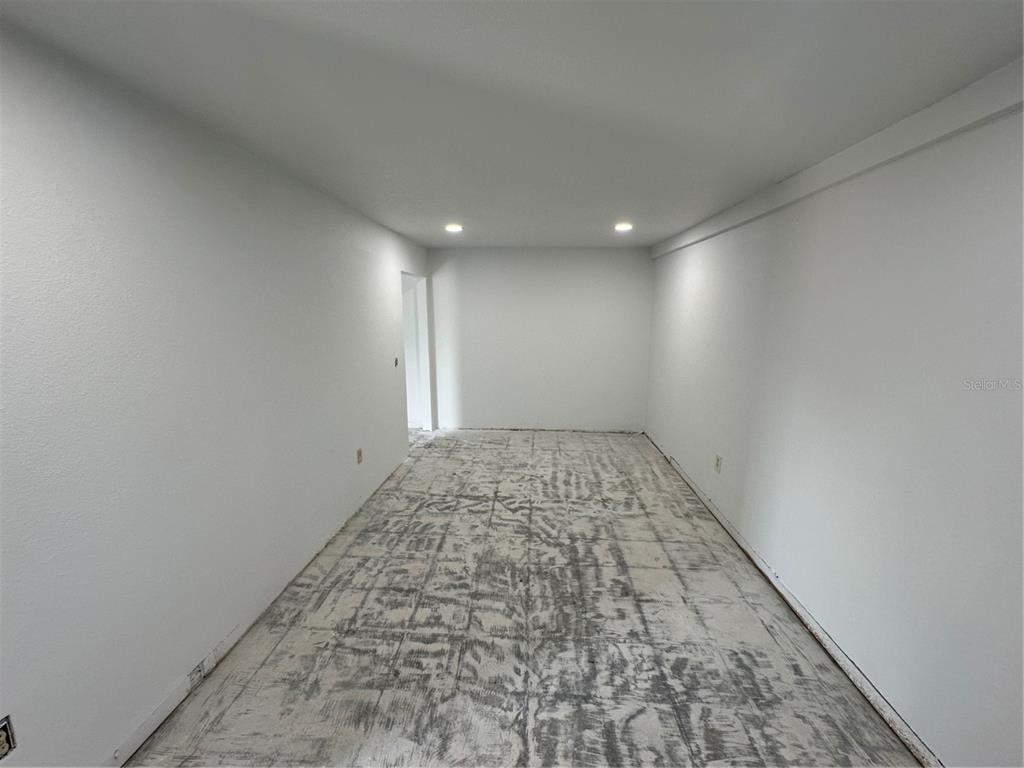 4459 Holden Road Lakeland, FL 33811 - Photo 14 of 27 wooden floor in an empty room