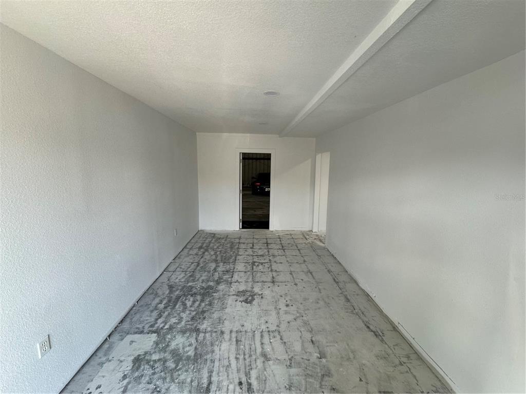 4459 Holden Road Lakeland, FL 33811 - Photo 15 of 27 wooden floor in an empty room