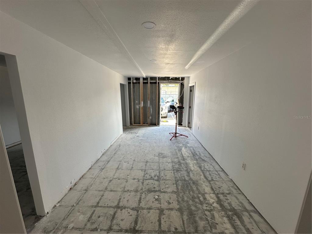 4459 Holden Road Lakeland, FL 33811 - Photo 17 of 27 a view of an empty room and a window