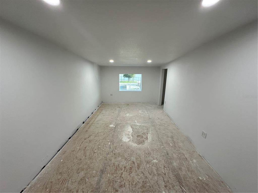 4459 Holden Road Lakeland, FL 33811 - Photo 21 of 27 an empty room with window