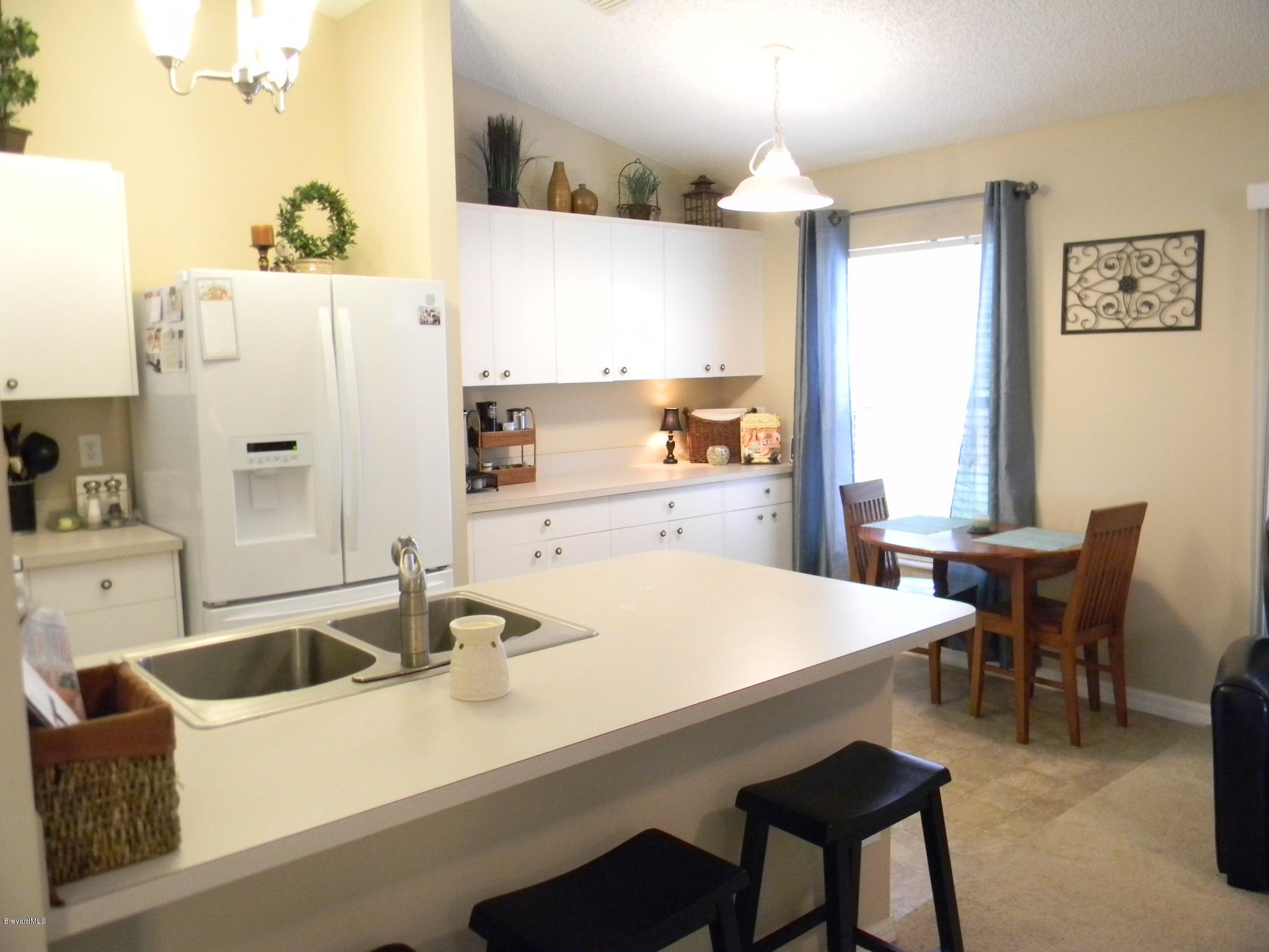 7675 Fringe Place Cocoa, FL 32927 - Photo 5 of 17 Kitchen & Breakfast Area