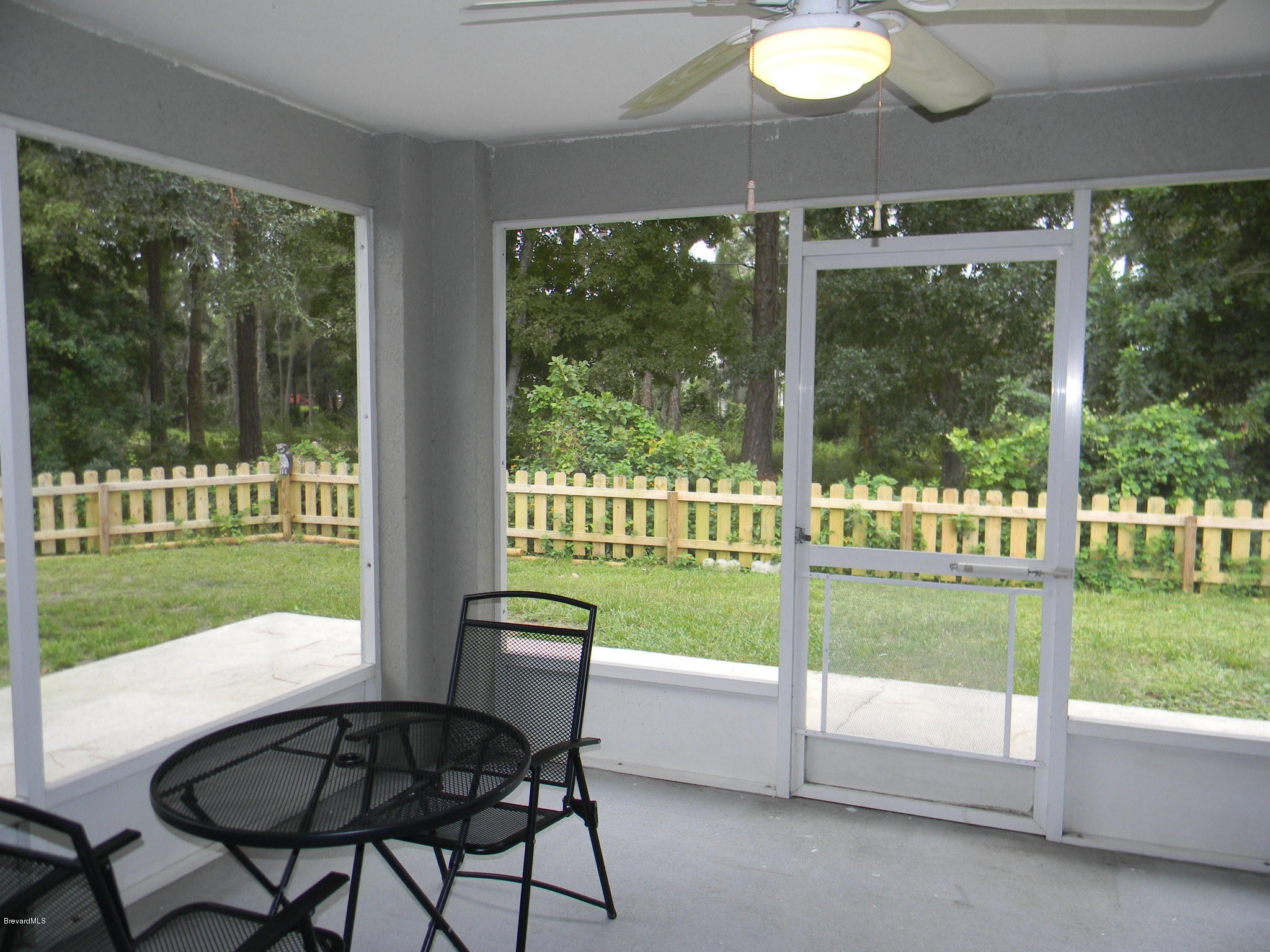 7675 Fringe Place Cocoa, FL 32927 - Photo 8 of 17 Trussed Back Screened Porch