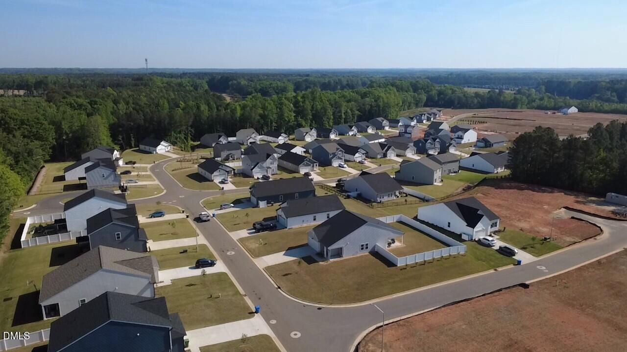 11487 Salers Loop Middlesex, NC 27557 - Photo 12 of 31 an aerial view of a house with lake view
