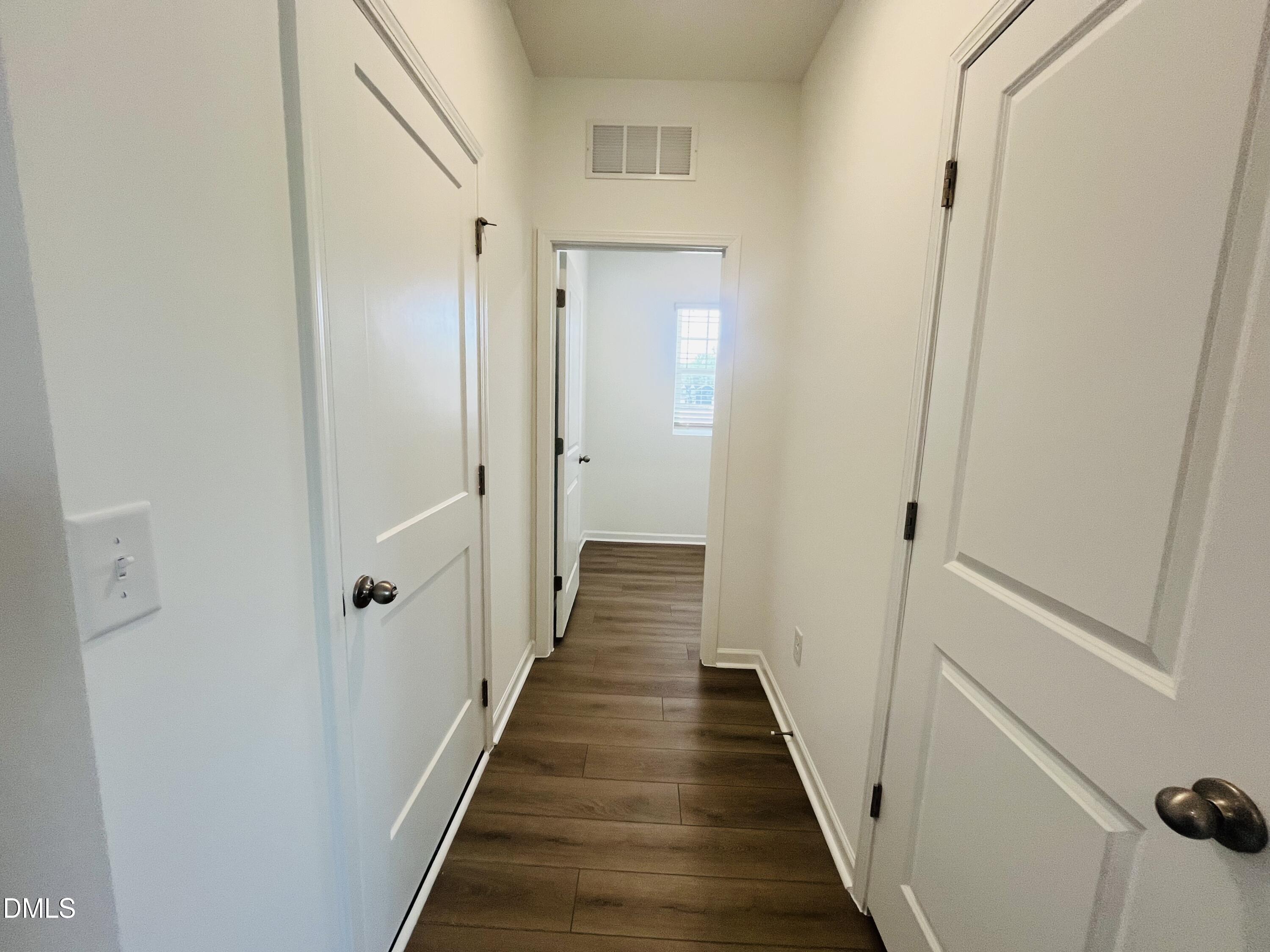 11487 Salers Loop Middlesex, NC 27557 - Photo 28 of 31 a view of a hallway with the wooden floor