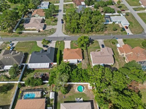 11251 Pickford Street Spring Hill, FL 34609 - Photo 24 of 29 an aerial view of house with yard swimming pool and outdoor seating