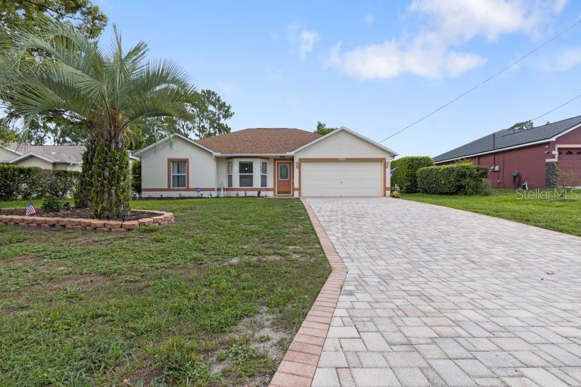 11251 Pickford Street Spring Hill, FL 34609 - Photo 29 of 29 a front view of a house with a yard