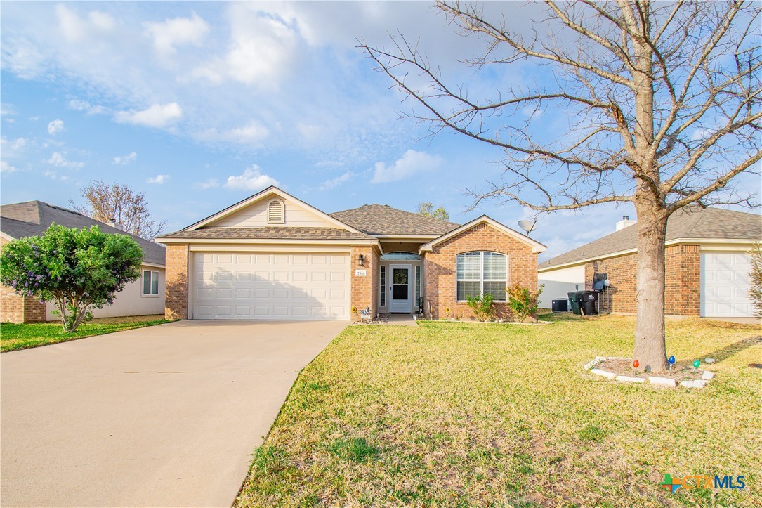7916 Honeysuckle Temple, TX 76502 - Photo 1 of 20 a front view of a house with a yard and garage