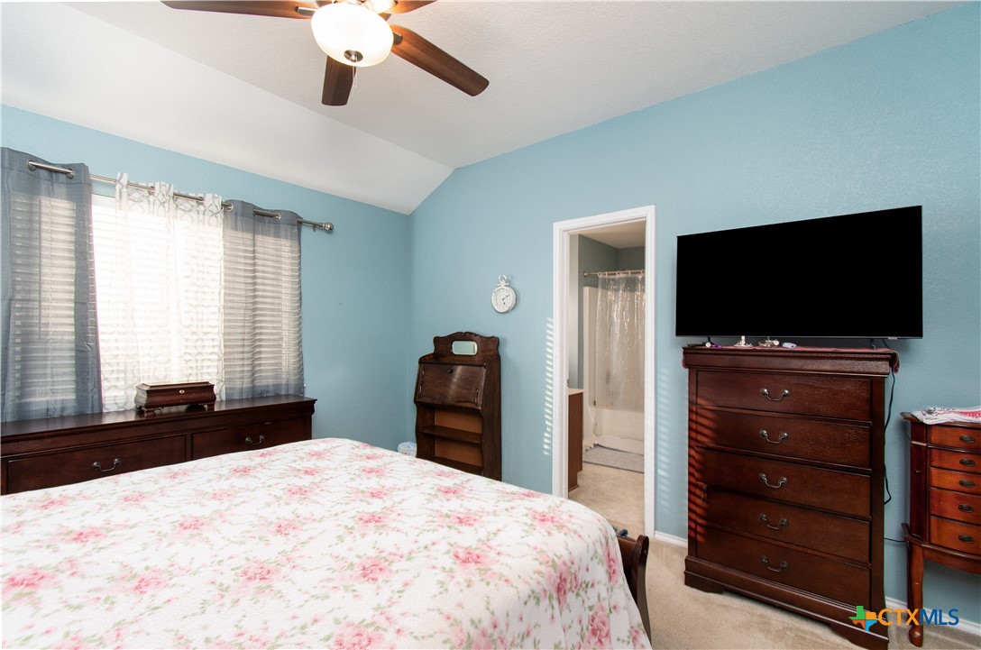 7916 Honeysuckle Temple, TX 76502 - Photo 14 of 20 a bedroom with a bed and a flat screen tv