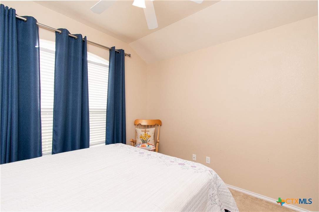 7916 Honeysuckle Temple, TX 76502 - Photo 19 of 20 a bedroom with a bed and a window