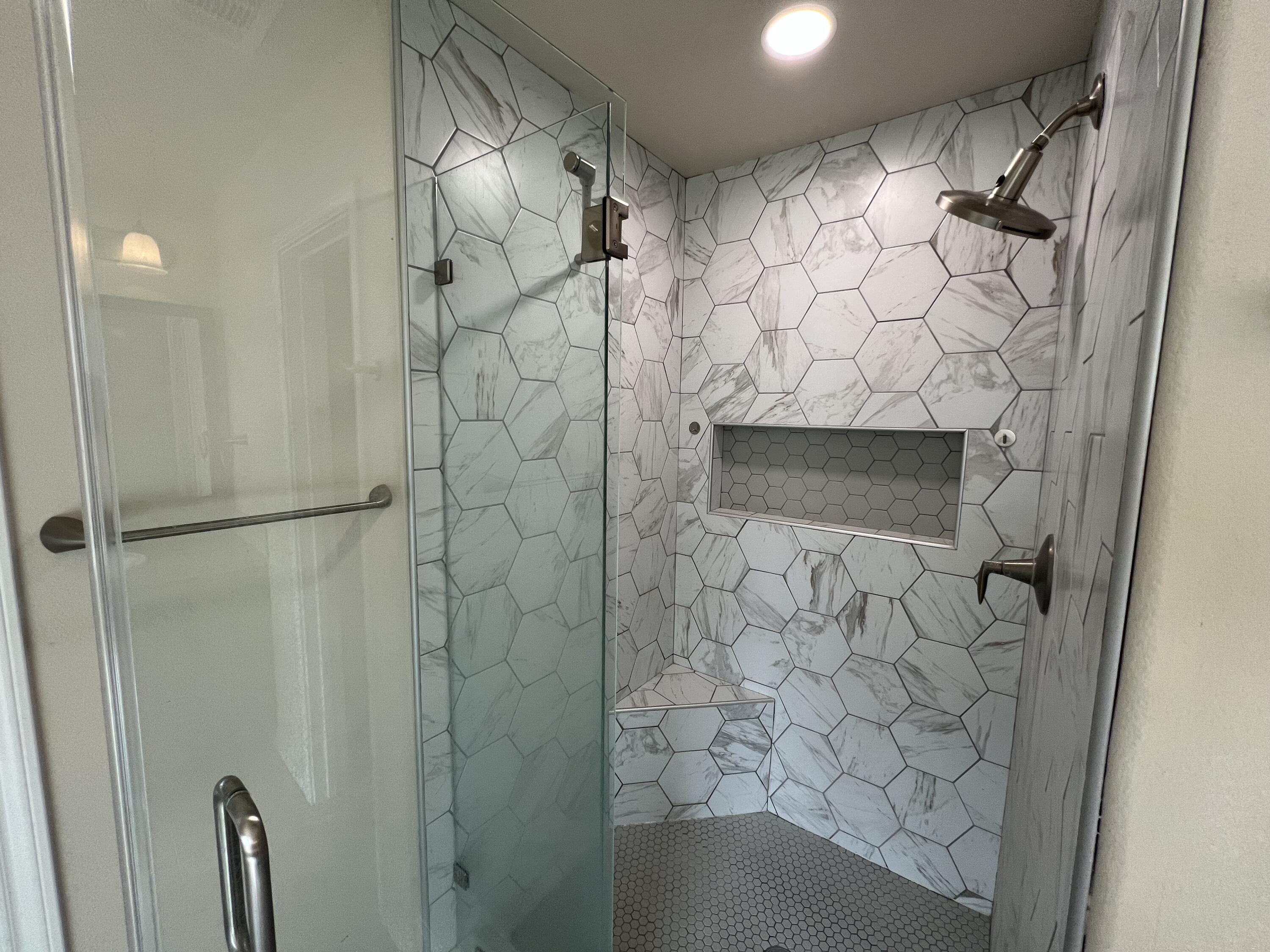 7349 100th Street Lubbock, TX 79424 - Photo 20 of 28 a bathroom with a shower