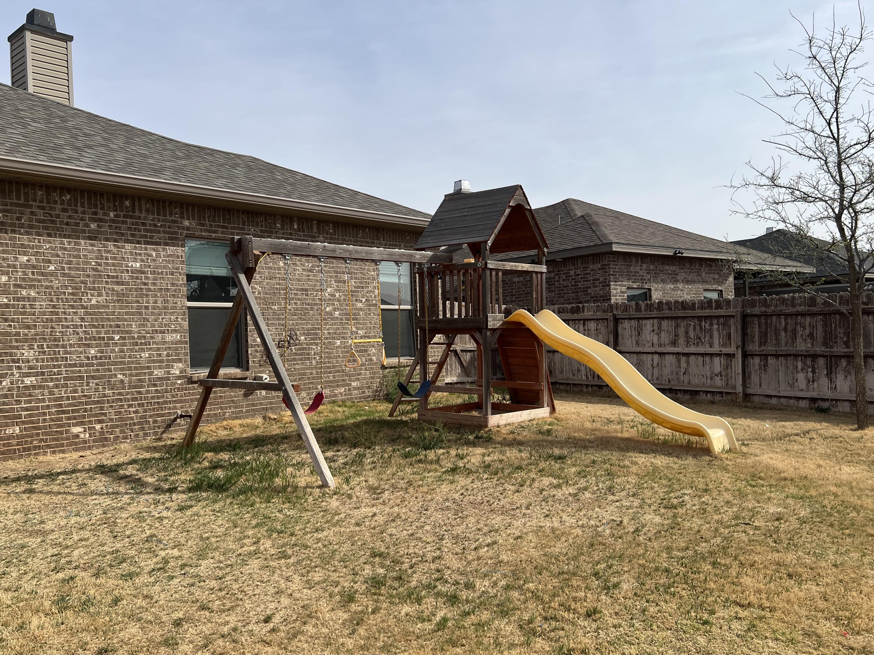 7349 100th Street Lubbock, TX 79424 - Photo 25 of 28 a view of a house with a park