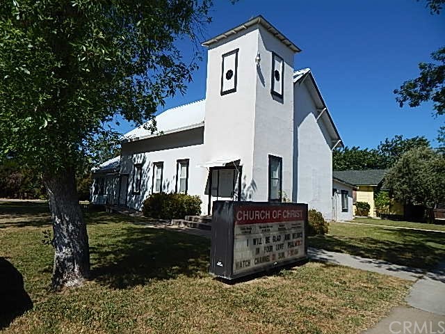 1440 Yolo Street Corning, CA 96021 - Photo 1 of 1 a front view of a house with garden