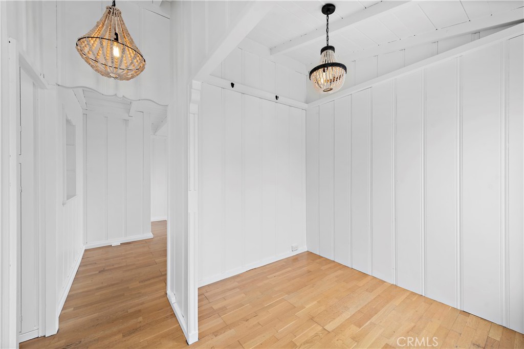 31711 Fairview Road Laguna Beach, CA 92651 - Photo 10 of 20 a very nice looking hallway with a chandelier