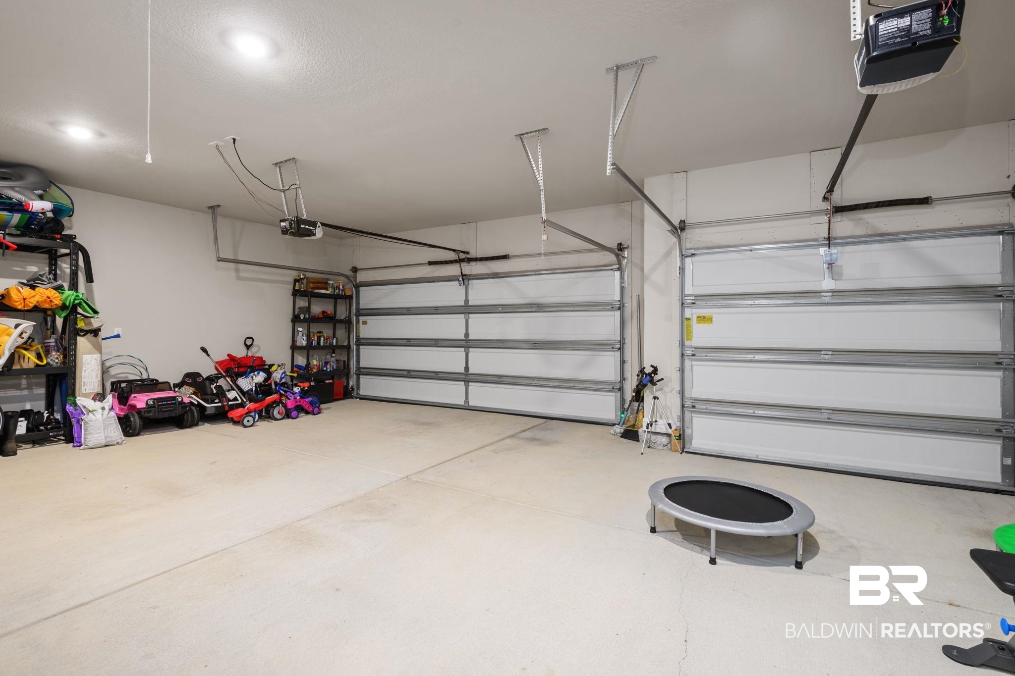 2183 Meadowview Loop Semmes, AL 36575 - Photo 47 of 58 Garage featuring a garage door opener