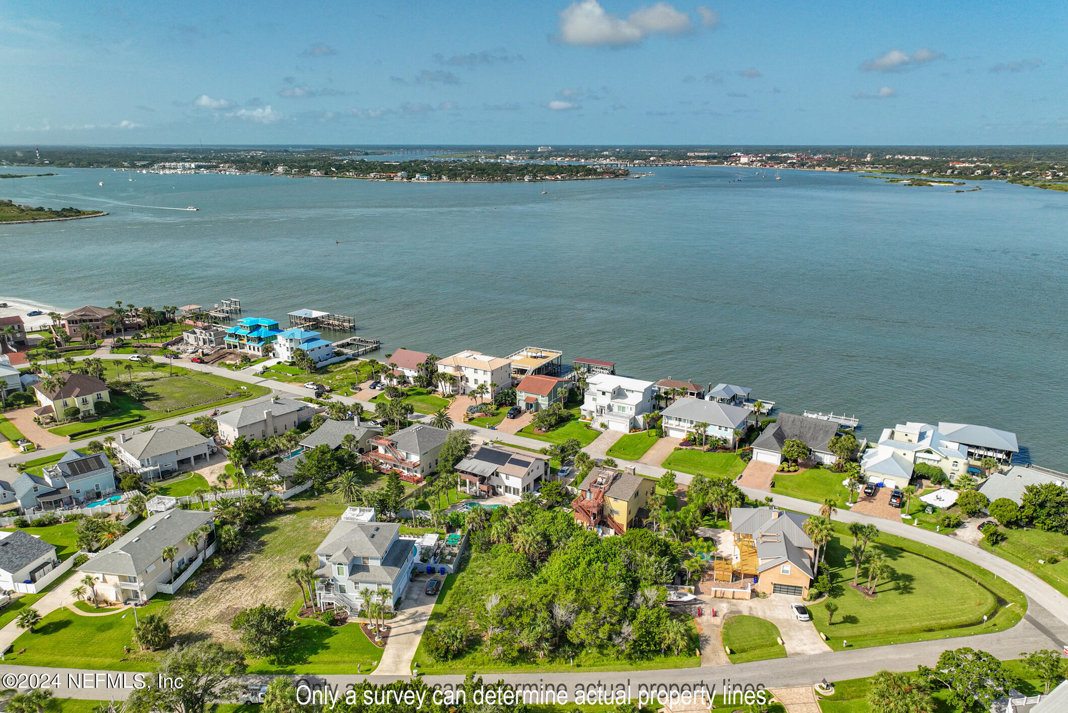 203 Sea Turtle Way St. Augustine, FL 32084 - Photo 21 of 28 a view of a lake with a city