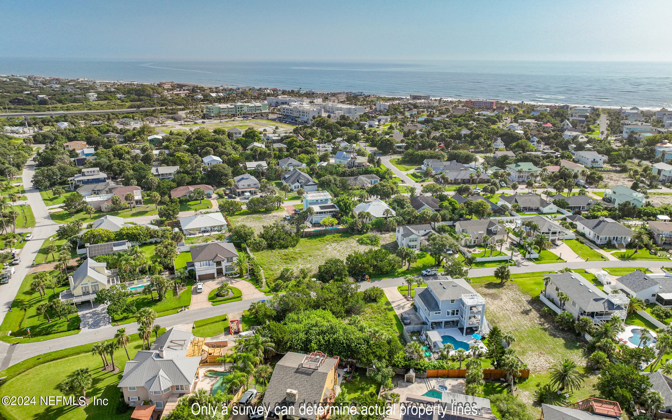 203 Sea Turtle Way St. Augustine, FL 32084 - Photo 24 of 28 an aerial view of a city with lots of residential buildings