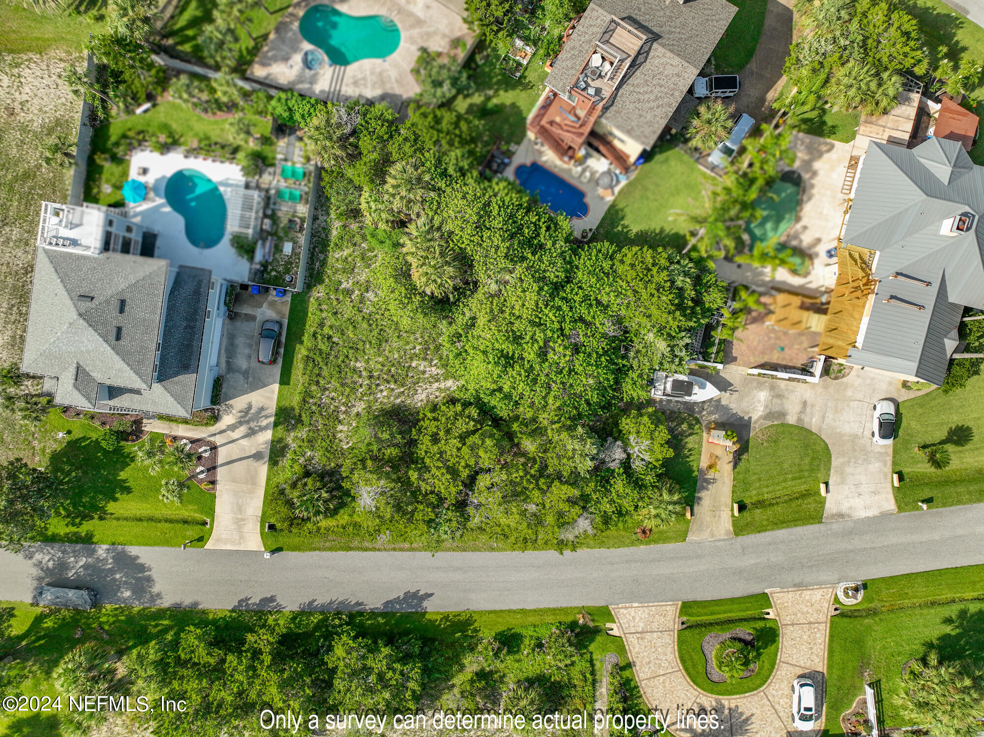 203 Sea Turtle Way St. Augustine, FL 32084 - Photo 28 of 28 an aerial view of a house with garden space and street view