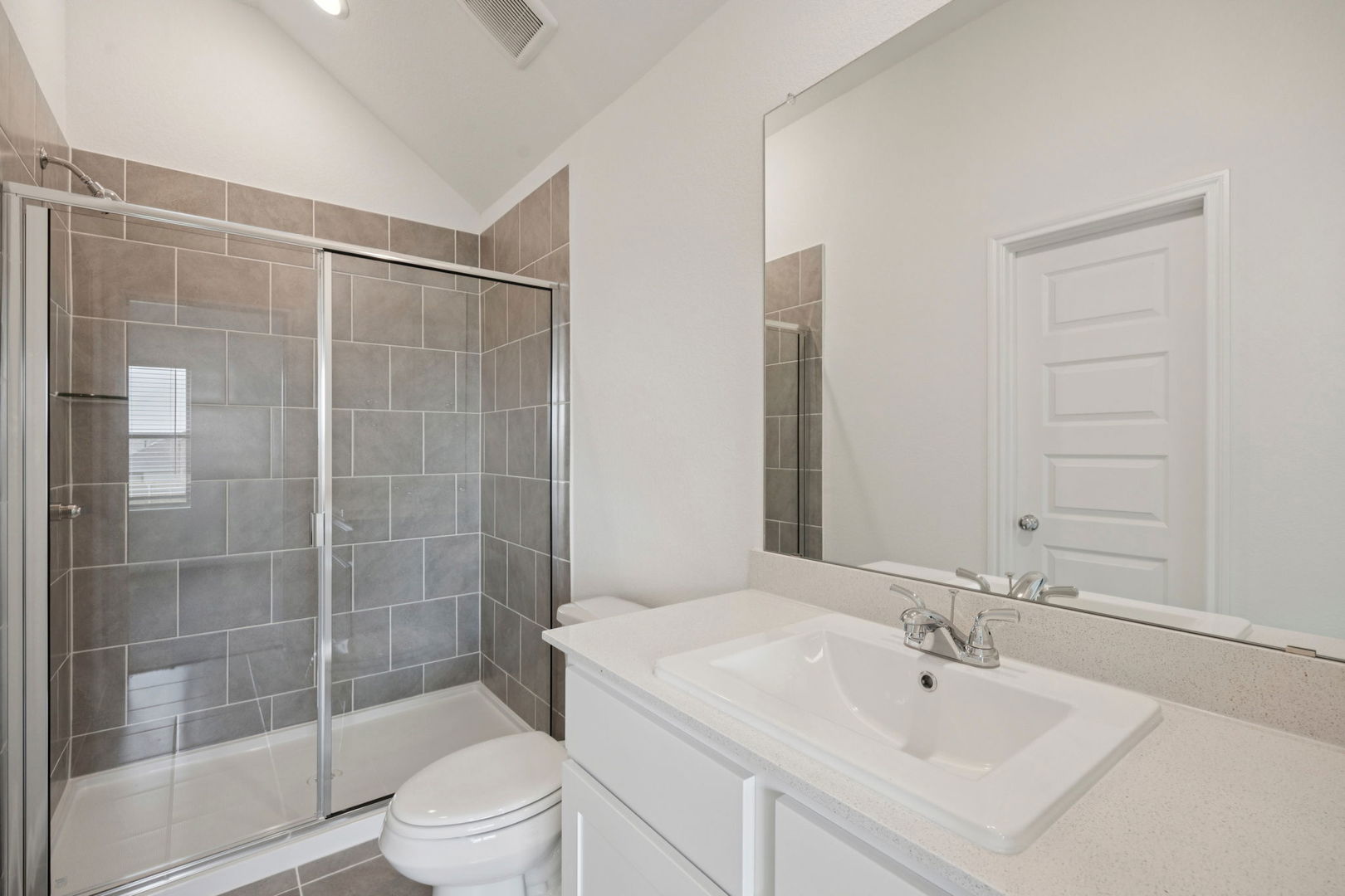 332 Bendecido Loop Elgin, TX 78621 - Photo 27 of 39 a bathroom with a sink toilet and shower