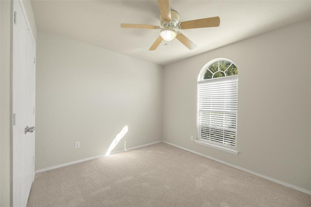 324 Meadow Ridge Drive Anna, TX 75409 - Photo 24 of 32 Secondary bedroom #2 with fresh paint and carpet
