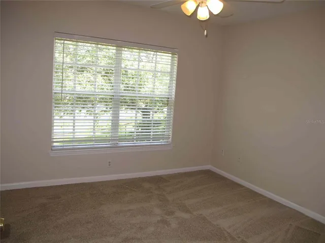 a view of a livingroom with a window