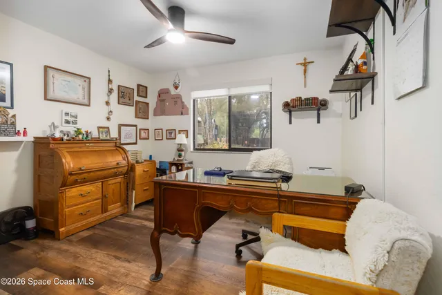 a bedroom with furniture and a bed