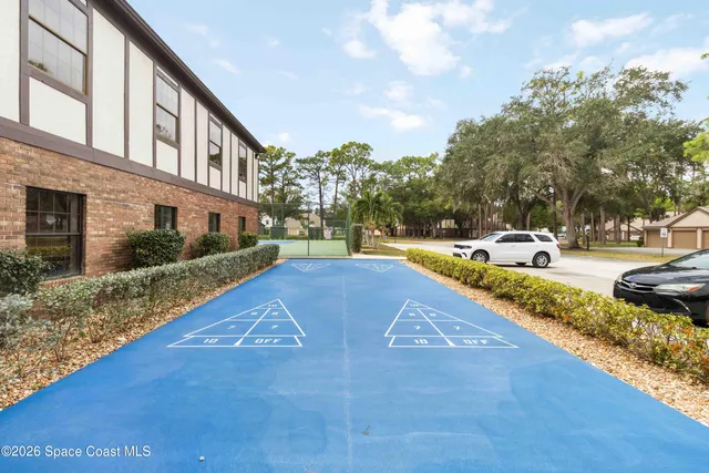 a view of outdoor space with swimming pool and patio