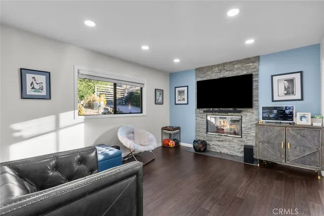 a bathroom with a bathtub shower sink and toilet