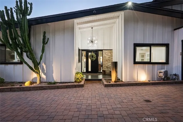 a room with furniture and a flat screen tv