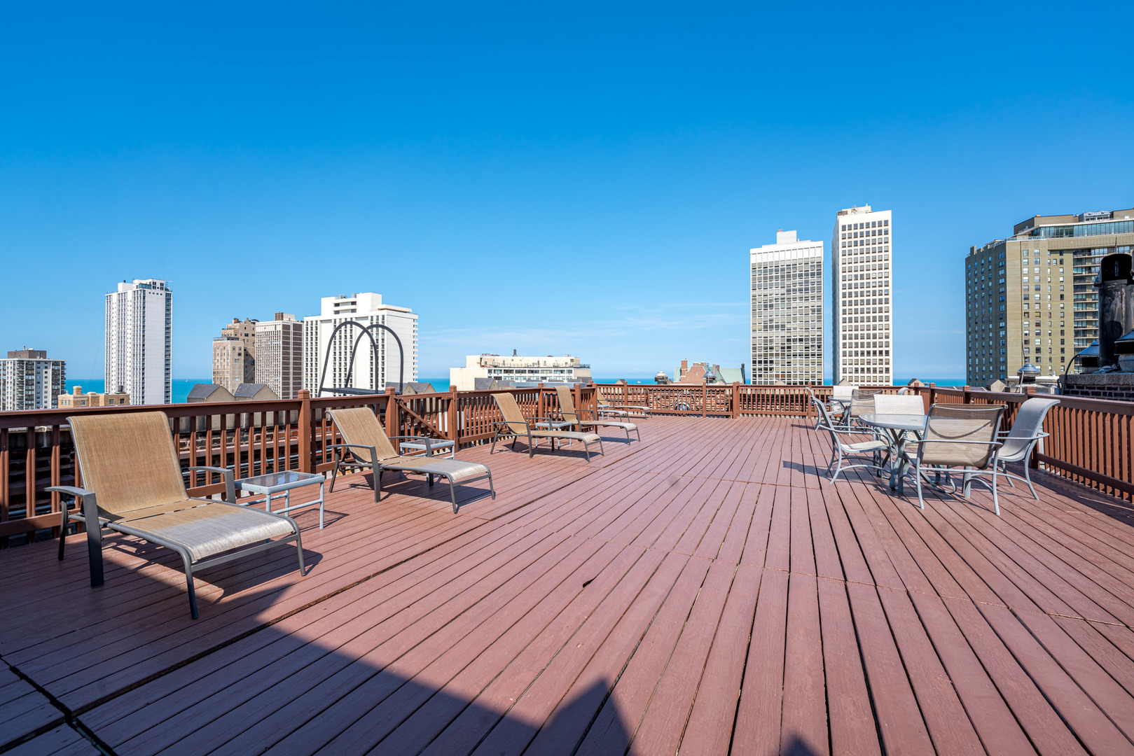 20 East Cedar Street, Unit 4D Chicago, IL 60611 - Photo 28 of 29 a view of roof deck with patio