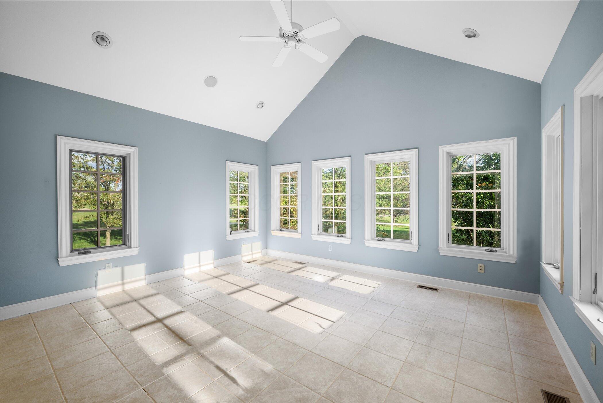18261 Boerger Road Marysville, OH 43040 - Photo 28 of 94 Vaulted sunroom with can lighting and fan - so many windows!