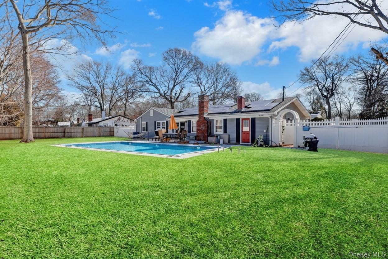15 Whitmore Lane Coram, NY 11727 - Photo 10 of 10 a view of house with a big yard