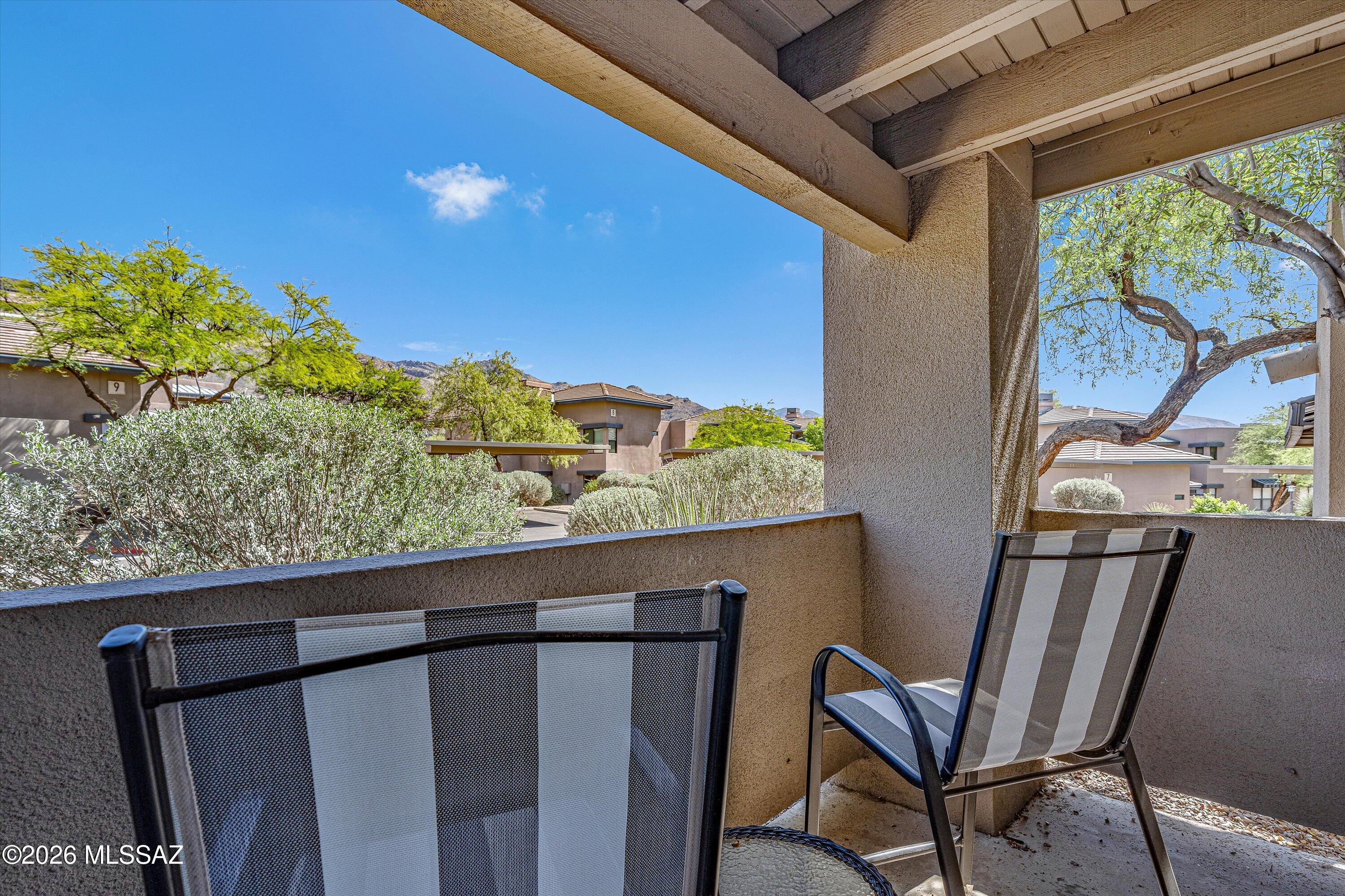 5800 North Kolb Road, Unit 1102 Tucson, AZ 85750 - Photo 18 of 36 a view of chair and table in the balcony